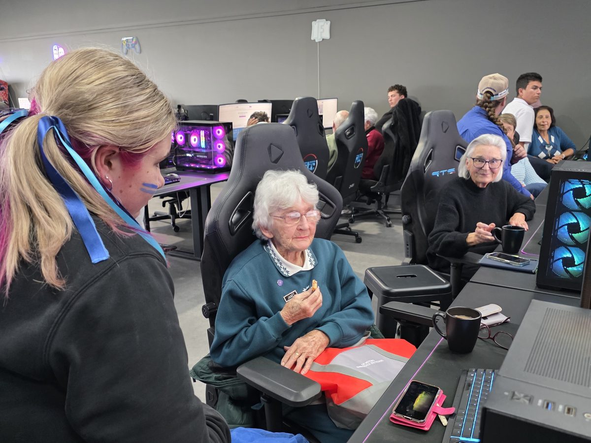 A young mentor helping an older learner in East Gippsland